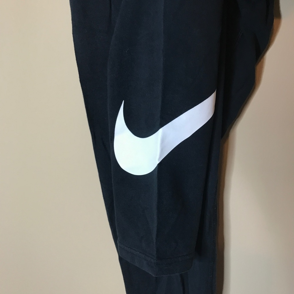 Women's Nike leggings with swoosh on leg